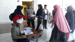 Polisi Kawal Penyaluran BLT-DD Desa Perampuan Labuapi